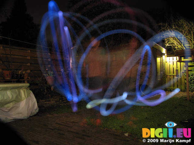 SX11042 Jenni demonstrating diy glowin in the dark poi in the back garden